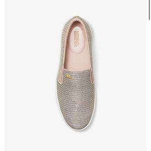 Brand new Michael Kors slip on sneakers.